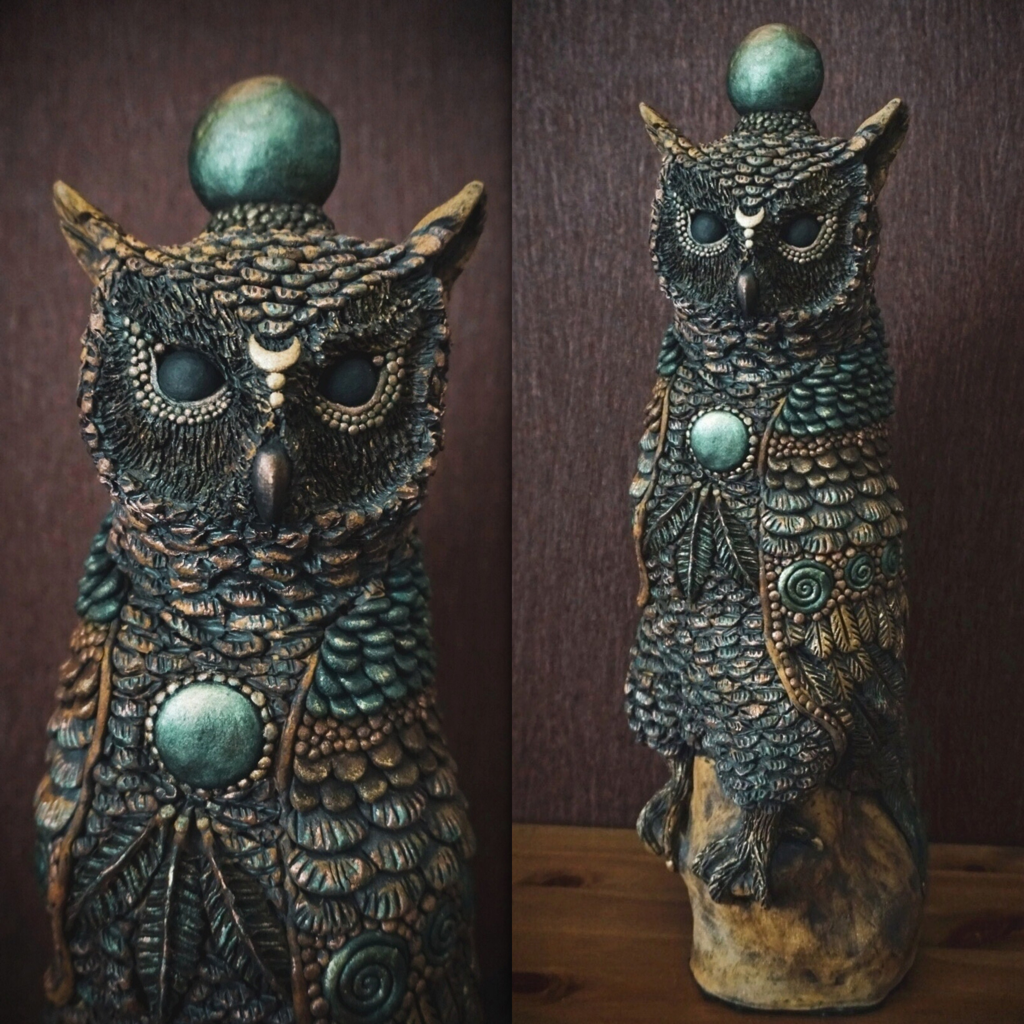 Ceramic owl sculpture
